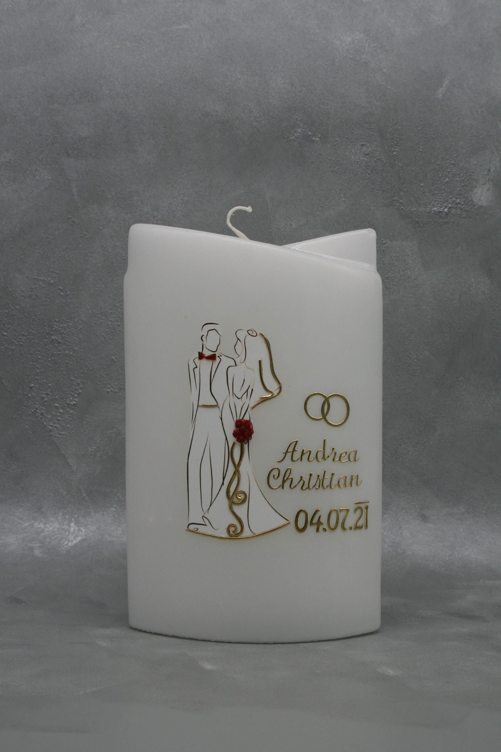 Hochzeitskerze mit Brautpaar und Ehering